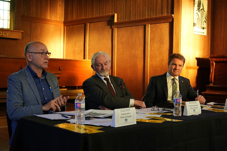 Conservative candidate Ellis Ross, left, Christian Heritage candidate Rod Taylor, centre, and NDP incumbent candidate Taylor Bachrach attended a federal all-candidates forum in Burns Lake on April 17, 2025.