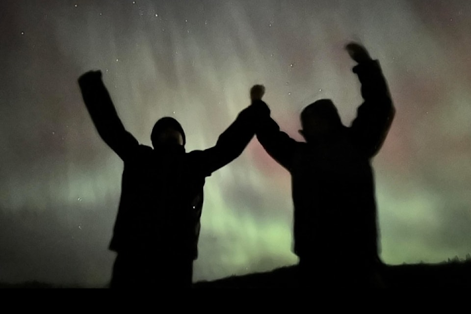 On New Year’s Eve  Lake residents Keyan and his friend Hayden enjoyed the Northern Lights while mom Nikki captured this great photo.