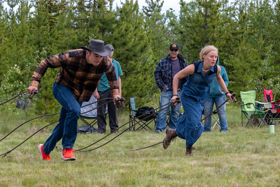 Over 300 community members came together June 28, 2025 to celebrate the 100th anniversary of Wistaria Hall. There was a pig roast, kids' games, logger sports, and a family dance with a live band.