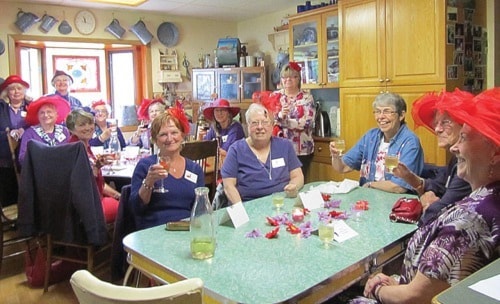 Red Haute Swans Society luncheon fit for a Queen