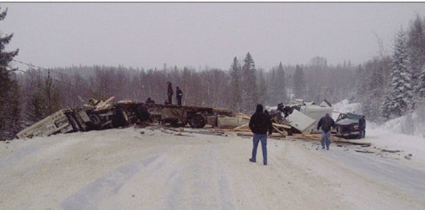 One dead as semis collide head-on