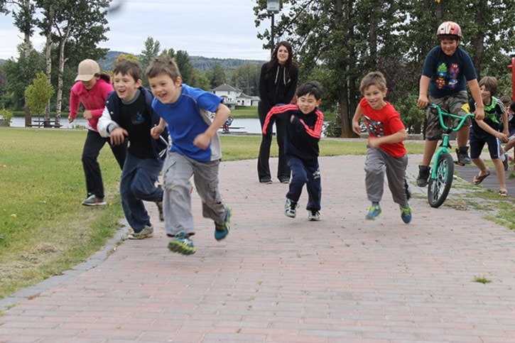 Kids run to drop-in theme camp