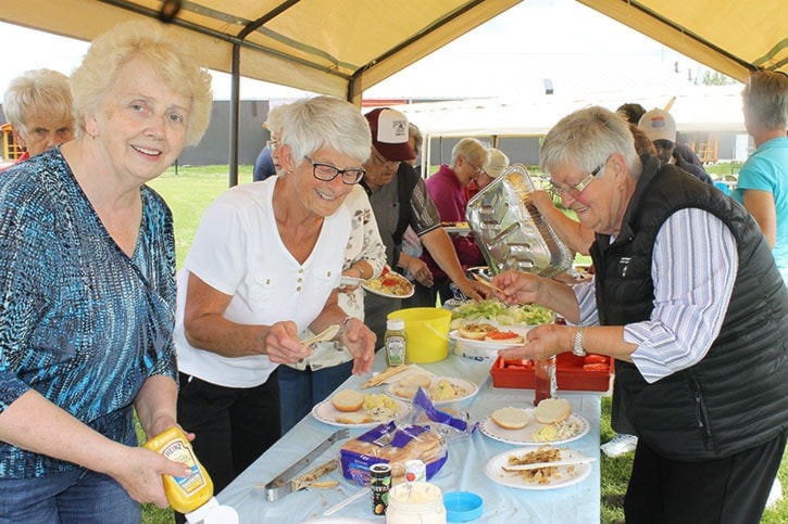 Seniors in the park for luncheon