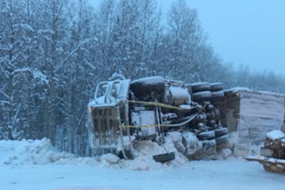 10457085_web1_180202-LDN-M-Semi-truck-rollover