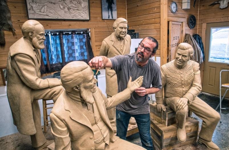 Sculptor Nathan Scott adds detail to the tremendous clay mutton chops of John Abbott. Looking on is the ill-fated John Thompson (front right), the 68-day leader Charles Tupper (back right) and Mackenzie Bowell (back left). (Dave Eagles/Kamloops This Week)