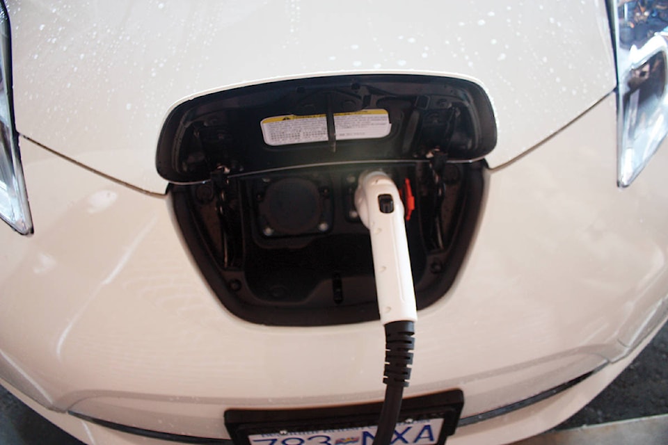 22579512_web1_electric-car-plug-in-1