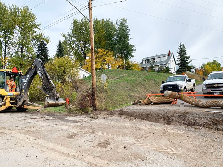 On Sept. 27, new culverts were put in by construction workers on Centre Street between First and Third Avenue. The project was completed in a day, and the goal was to get the work done before paving projects start up in the area again some time in mid October. (Eddie Huband photos/Lakes District News)