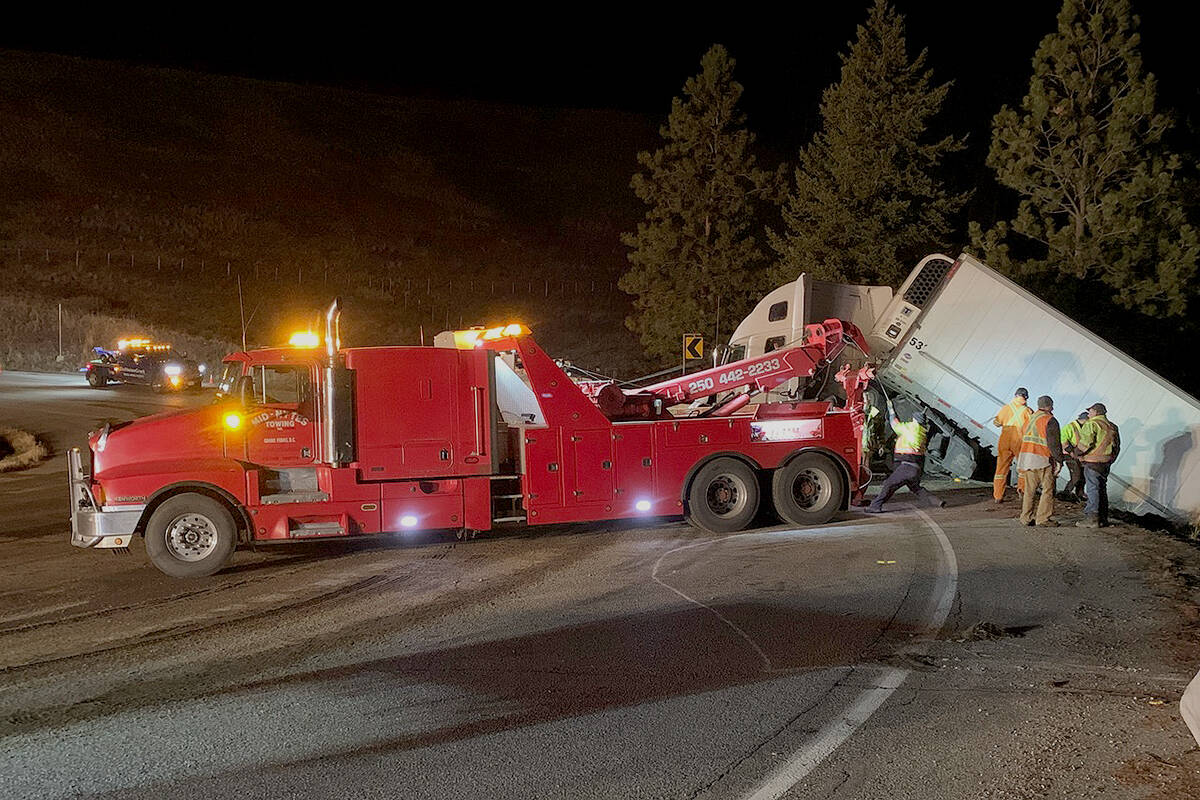 Grand Forks Mid-Nytes Towing had to be called in to hoist the fallen trailer back onto the highway. Photo: Submitted