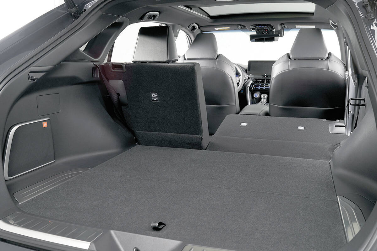 The battery pack that powers the three electric motors resides beneath the rear seat. The cargo capacity is slightly less than the RAV4Â’s, but that has more to do with the RAV4Â’s squarer shape. PHOTO: TOYOTA