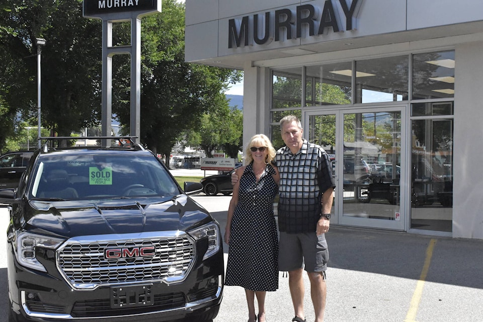 A couple travelled from Osoyoos to Penticton on Friday, June 24, to pick up their new vehicle after winning a Canada-wide contest, courtesy of General Motors. (Logan Lockhart- Western )