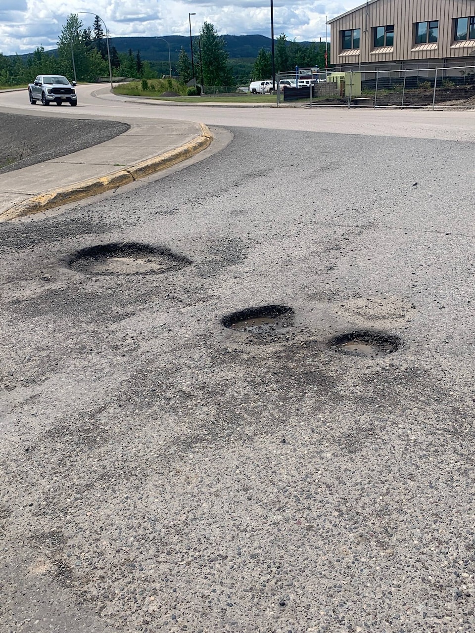 29558891_web1_220629-LDN_potholes-pothole_1