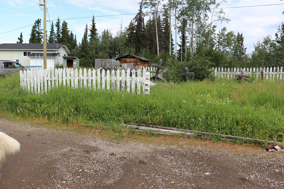 Volunteers and community members help cleanup gravesites on Hamre Road as part of an initiative by the Cheslatta Carrier Nation on Aug. 5, 2022 (Lana MacDonald/Contributed to Black Press Media)