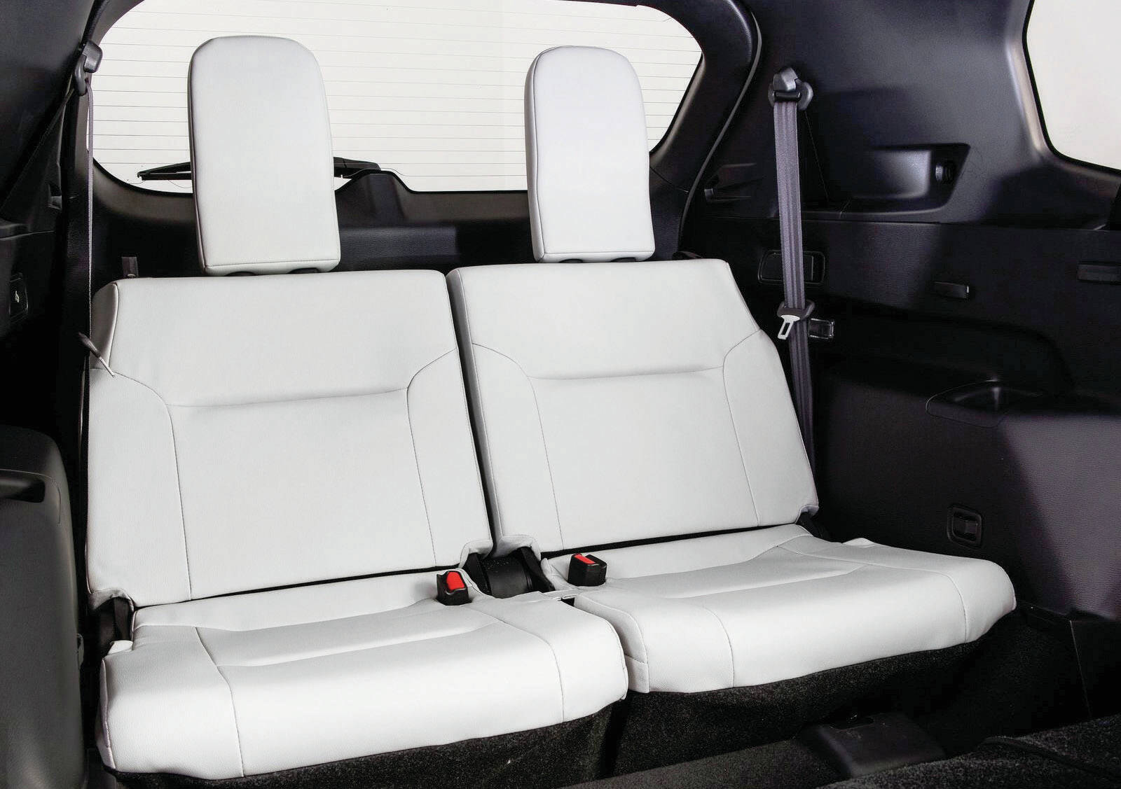 The Outlander SEL聮s quilted upholstery is a nice high-end touch even if they contrast a rather featureless stretch of dashboard. PHOTO: MITSUBISHI