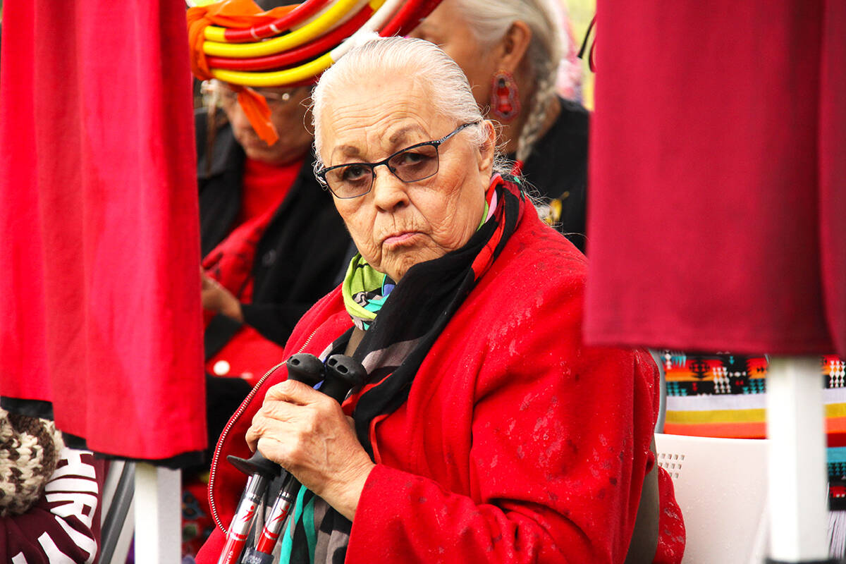 Dozens of people gathered at Vancouver City Hall Thursday (May 5) to mark Red Dress Day and call attention to the continued crisis of missing and murdered Indigenous women, girls and two-spirit people. (Jane Skrypnek/Black Press Media)