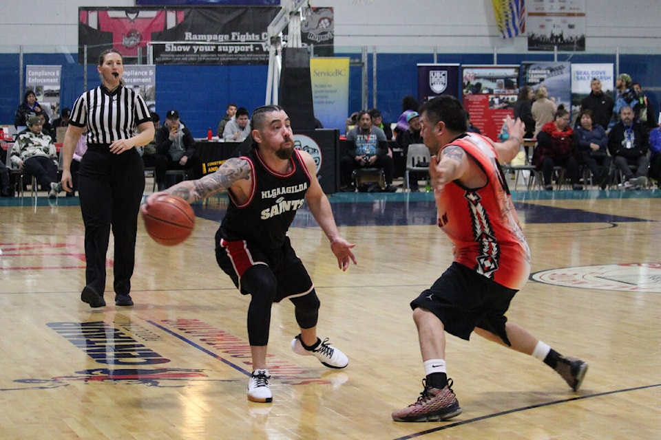 Masters Skidegate (black) vs Heiltsuk, Feb 15. (Thom Barker photo)