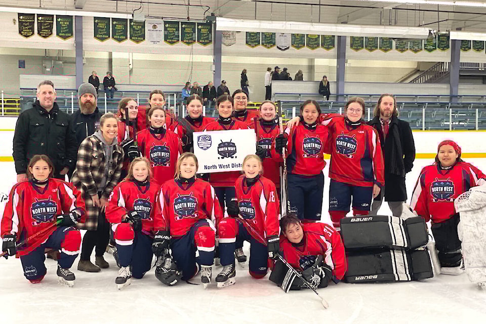 The U15 Female North West regional team are all smiles after winning one of their games at hockey provincials in Kamloops in March. Pictured are; assist coach Colin Batemen of Smithers (back row from left), head coach Wes Hart of  Lake, Nicole Bateman of Smithers, Jericho Tse of Kitimat, Taylor Siemens of Vanderhoof, Marika Jack of Hazelton, manager Nyree Hazelton of  Lake (middle row from left), Leeara Betts of Hazelton, Eden Tse of Kitimat, Elencia Hazelton of  Lake, Kaylee Levick of  Lake, Alayna Hart of  Lake, assist coach Dan Plante, Miley Harris of Hazelton (front row from left), Kate Thiessen-Clark of Vanderhoof, Maci Kadonaga of Vanderhoof, Kiah Thiessen-Clark of Vanderhoof, Kamryn Gutierrez-Perreault of Kitimat and Jada Adams of Hazelton. Missing from the photo are Audrey Luggi of Fort St James and Alexis Erickson of  Lake. (Photo submitted)