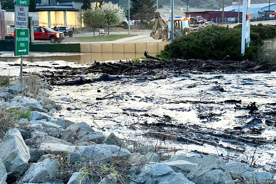 Cache Creek overflows the culvert at Quartz Road on the evening of April 29. (Photo credit: Sheila Olson)
