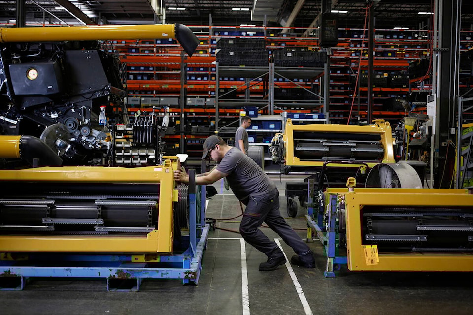 32593042_web1_230502-CVR-factory-worker_1