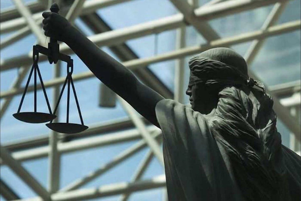 34228043_web1_230601-SUL-DistractedCourt-statue_1