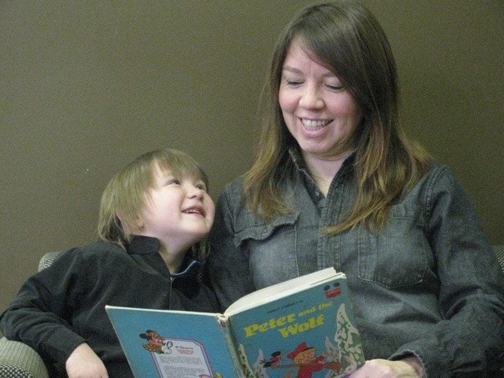 Shana Labatch reads to her daughter Danika Labach-Free.
Alex Michaels/CNC