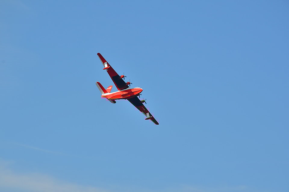The Martin Mars water bomber flies past Campbell River around 4 p.m. Aug. 11, 2024, on its last flight on its way to the B.C. Aviation Museum in Saanich. 