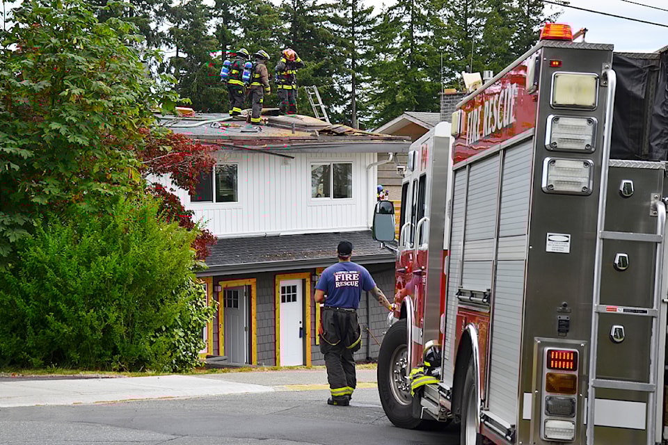 Firefigthers focus their attention on the attic of a 2nd Avenue house during a callout on Monday, July 22 around 11 a.m. 