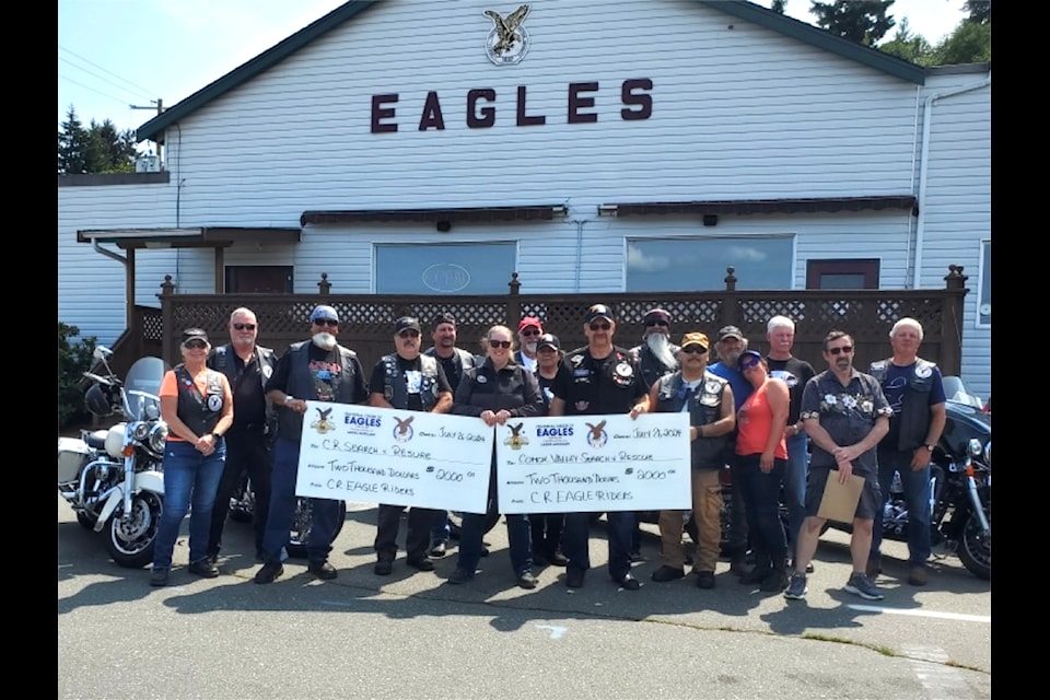 The Fraternal Order of Eagles of Campbell River present cheques to Campell River and Comox Valley Search and Rescue. 