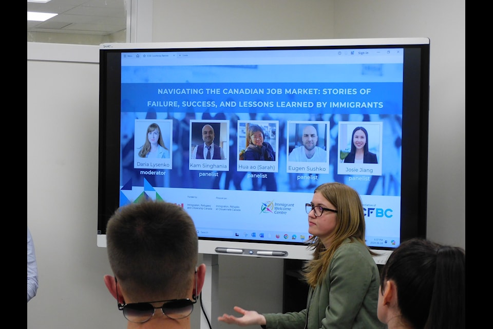 Moderator Daria Lysenko speaks during the event.
