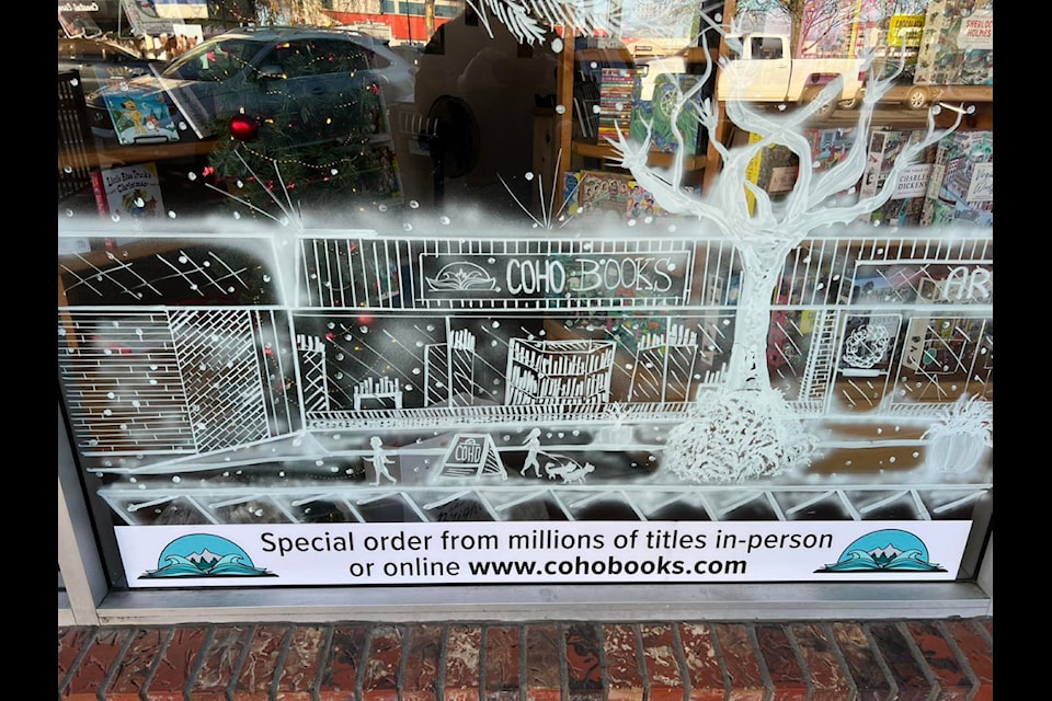 Coho Books' Transgender Visibility Day window display before it was vandalized. 