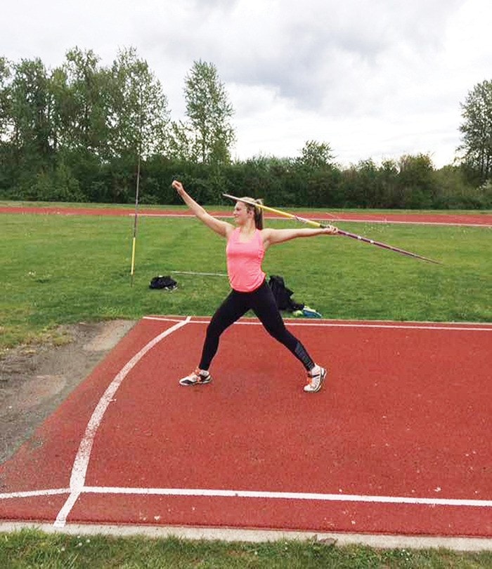 Hayley Hunter, ranked number two in the country for javelin, takes aim.