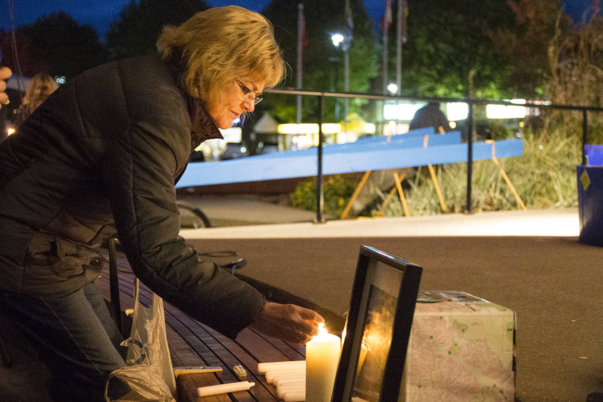 9089039_web1_171027-CRM-jordan-holling-candlelightvigil_7