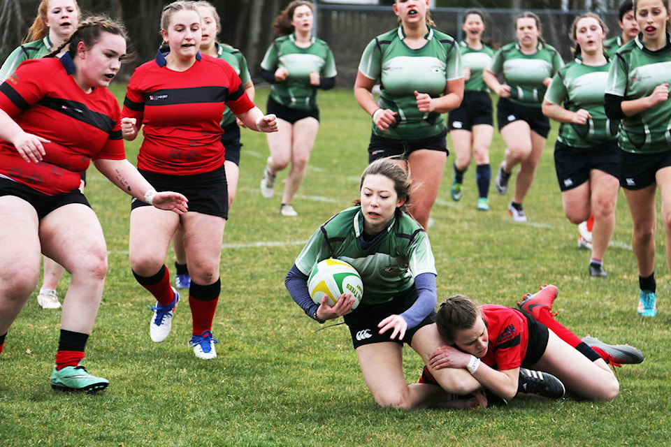 11163913_web1_Girls-Rugby-March-21