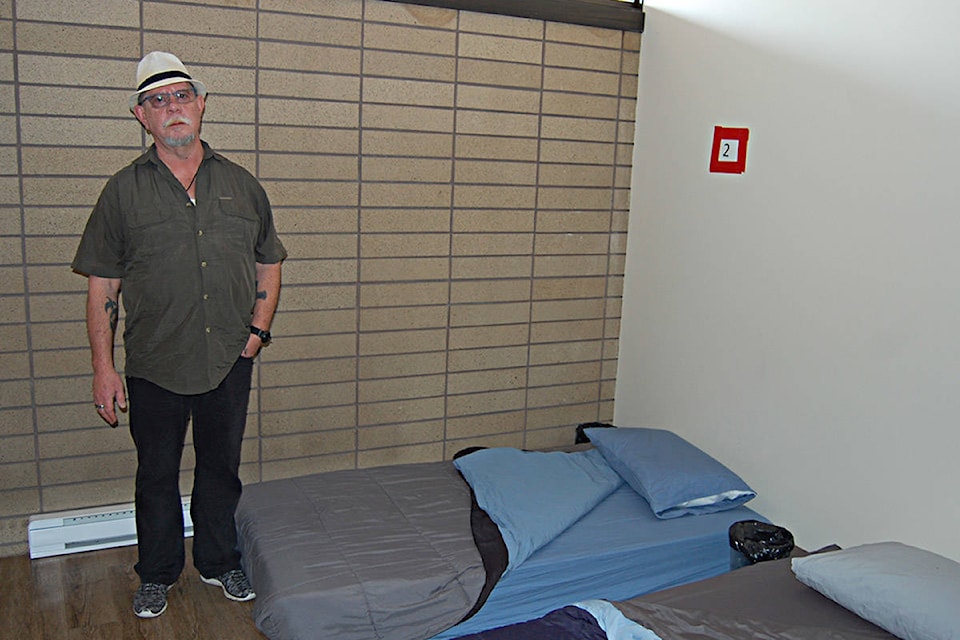 Kevin James, coordinator of the Campbell River Sobering and Assessment Centre, in a room containing emergency shelter beds, Feb. 13, 2019. Photo by David Gordon Koch/Campbell River Mirror