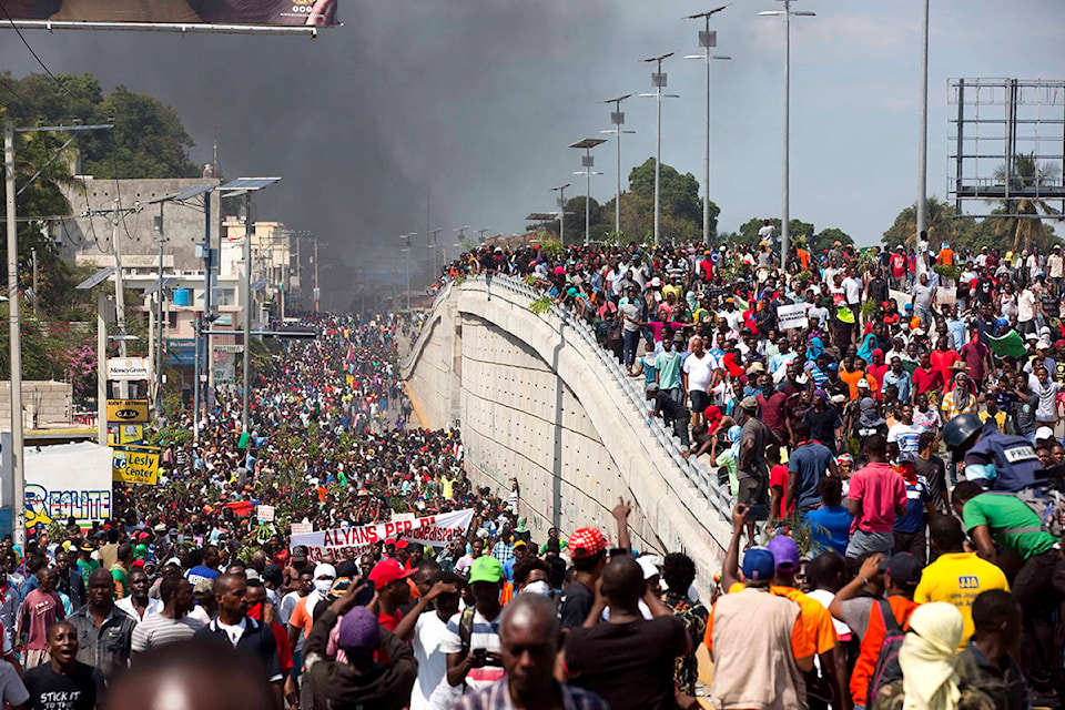 15591889_web1_Haiti-protests