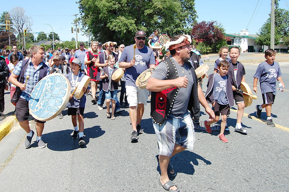 Shawn Decaire of We Wai Kai’s Cape Mudge band emceed the Big House celebrations before leading marchers through the city streets during Indigenous Peoples Day celebrations in Campbell River on Friday. Photo by David Gordon Koch/Campbell River Mirror