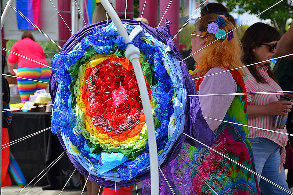 A rainbow weaving brought another splash of colour to the CR Pride Festival at Spirit Square on Saturday. Photo by Alistair Taylor/Campbell River Mirror