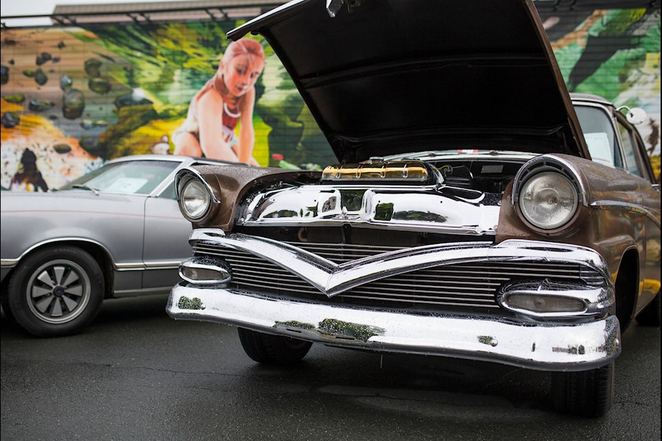 A 1956 Meteor Rideau Club Sedan sits with its hood open during the North Island Cruisers annual Show n Shine along Shoppers Row in Campbell River. Photo by Marissa Tiel/ Campbell River Mirror