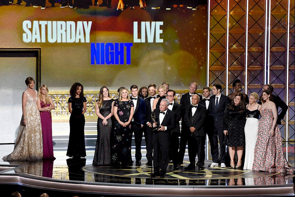 Lorne Michaels and the cast of SNL accept the award for outstanding variety sketch series for “Saturday Night Live” at the 69th Primetime Emmy Awards on Sunday, Sept. 17, 2017, at the Microsoft Theater in Los Angeles. (Photo by Chris Pizzello/Invision/AP)