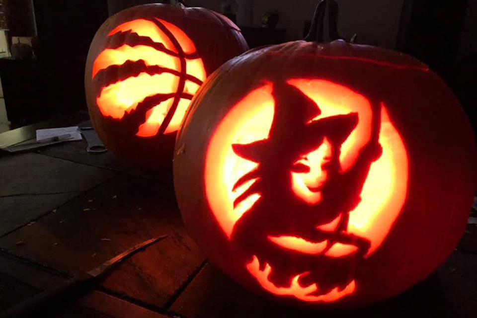 Natasha Claudia’s pumpkins make a handsome pair: Go Raptors and a creepy witch’s cauldron.
