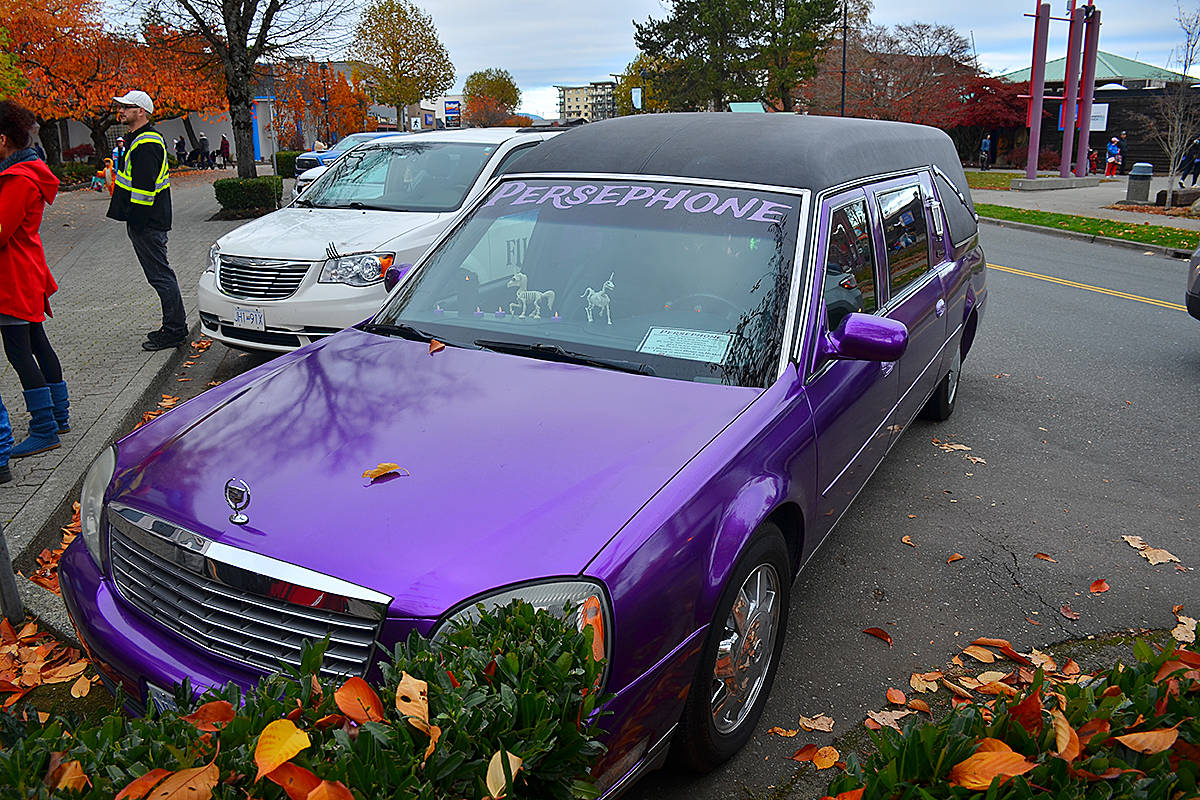 19198197_web1_191031-CRM-Halloween-downtown-hearse