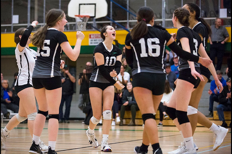 The Carihi Tyees celebrate a point during the Girls AAA Island Championship final at Carihi Secondary in Campbell River on Nov. 16, 2019. The Tyees beat the Stingers 3-1. Photo by Marissa Tiel/Campbell River Mirror