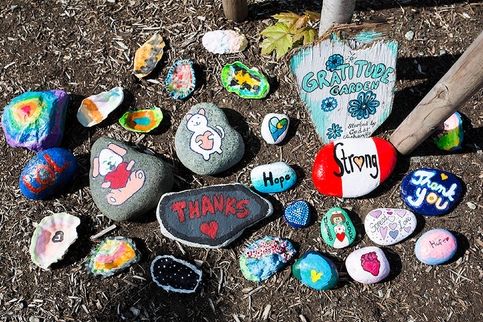 Cedar School students have started a gratitude garden at the Campbell River Hospital. They’ve assembled painted rocks and shells with positive messages just outside the front doors and are encouraging other students to add to the collection. The rocks are seen here on May 10, 2020. Photo by Marissa Tiel – Campbell River Mirror