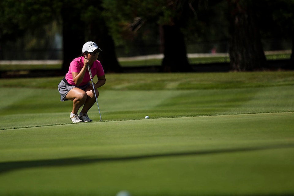 Dana Smith, 15, of Campbell River lines up her putt during day 2 of Golf BC’s amateur women’s provincial championship at the Campbell River Golf and Country Club in Campbell River, B.C. on Aug. 26, 2020. Photo by Marissa Tiel – Campbell River Mirror