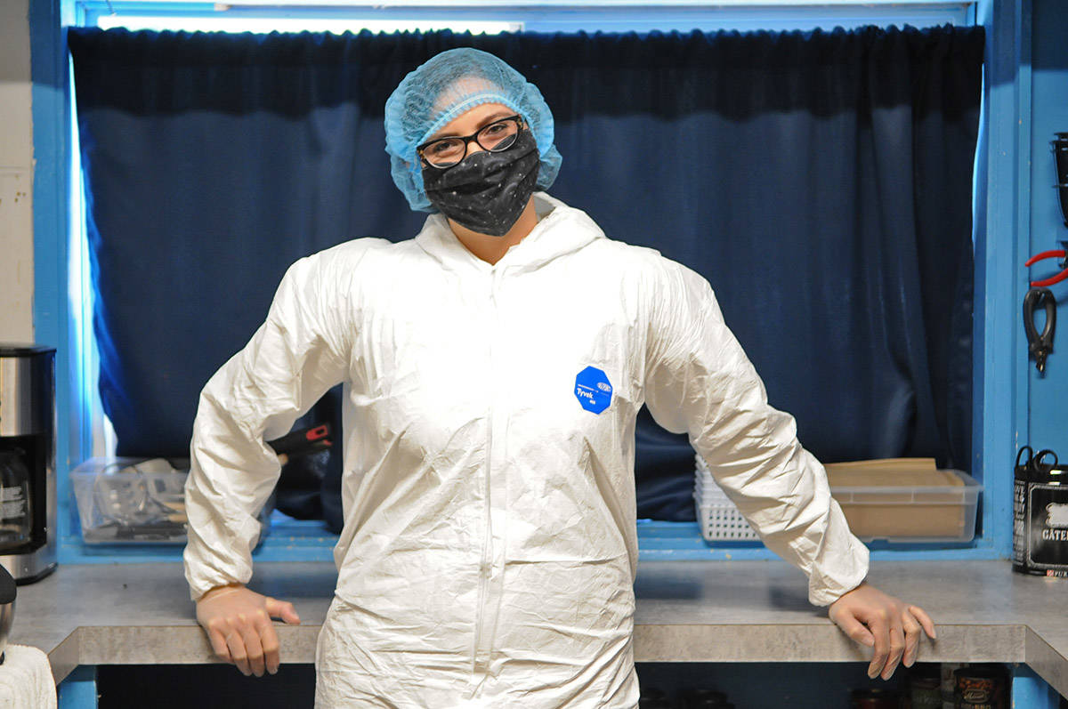 Chloé MacBeth, Chilliwack SPCA branch manager, stands in full PPE gear at the shelter on Wednesday, Oct. 7, 2020 where 11 dogs are in quarantine. (Jenna Hauck/ Chilliwack Progress)