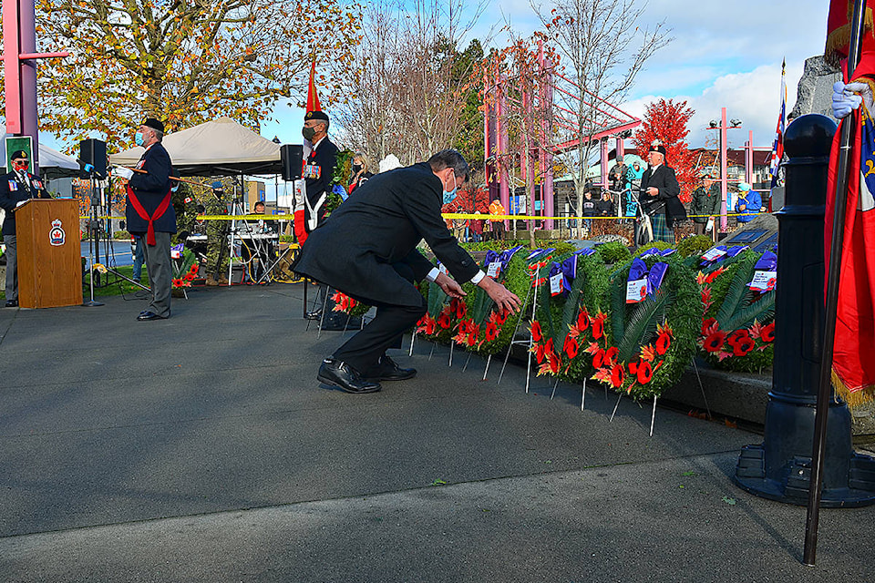 A smaller Remembrance Day 2020 ceremony was held in Campbell River Nov. 11 due to COVID-19 pandemic safety precautions. Mayor Andy Adams laid a wreath on behalf of the City of Campbell River. Photo by Alistair Taylor – Campbell River Mirror
