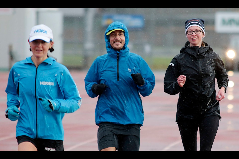 Ultramarathoner Jerry Hughes looks positive as he finishes his 98th lap of the Cowichan Sportsplex track on Sunday, Nov. 15, the first day of his bid to break the Canadian six-day running record. (Kevin Rothbauer/Citizen)