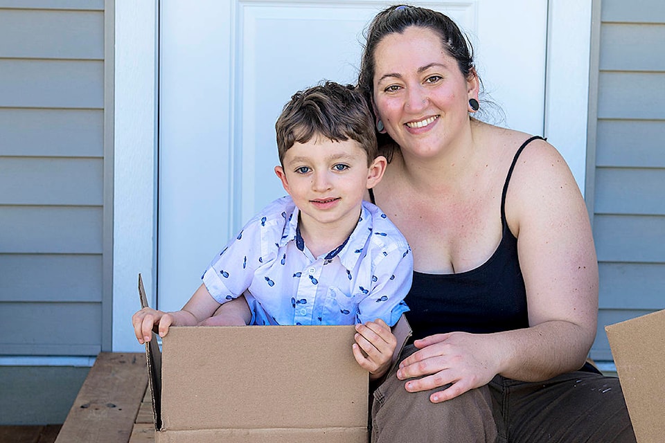 Afton Frost and her son have moved into one of Habitat for Humanity’s recently completed homes at 477 Hilchey Road. Photo by Karen McKinnon