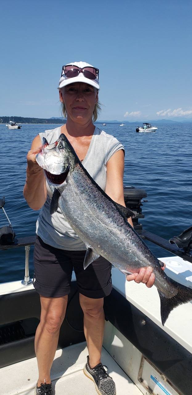 Sundre, Alberta couple did not the miss the boat for salmon fishing -  Campbell River Mirror