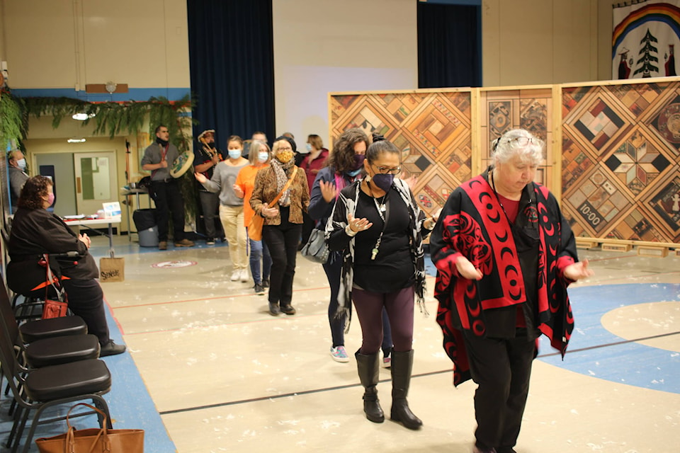 Laichwiltach Family Life Society executive director Audrey Wilson leads a dance during the opening of the Witness Blanket exhibit. Photo by Marc Kitteringham / Campbell River Mirror