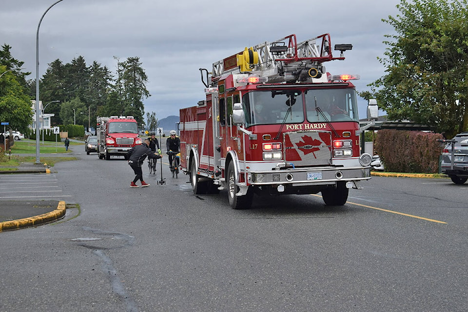 Port Hardy Fire Rescue escorted the 2021 North Island Tour de Rock team into Port Hardy on Monday afternoon. (Tyson Whitney - North Island Gazette)